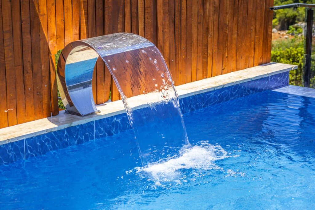 closeup view of a small pool aerator fountain