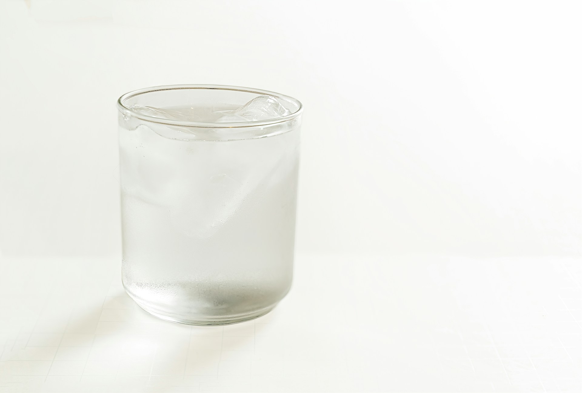 clear glass beaker with clear liquid; what is muriatic acid